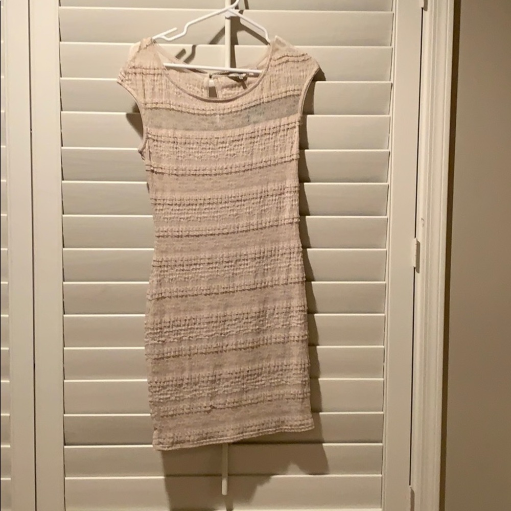 I have never worn the dress. Tags are still on!